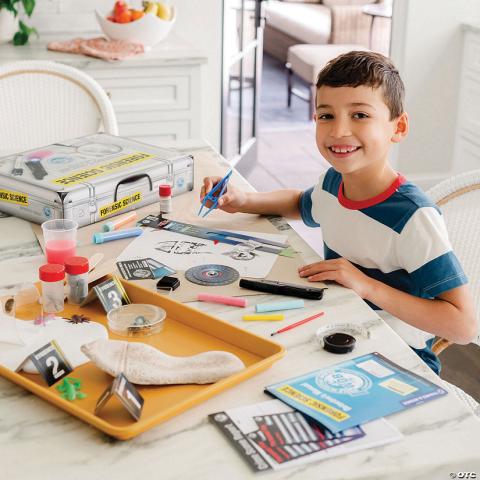 A kid using a forensics science kit.