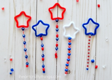 Star-shaped bubble wands made with red, white, and blue pipe cleaners and beads.