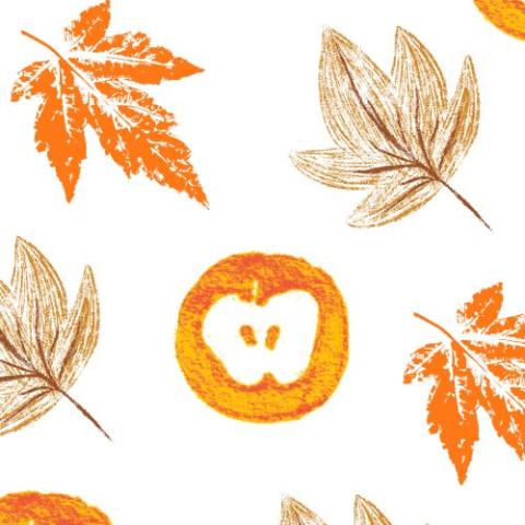 White background with orange and brown stamps of leaves and apples