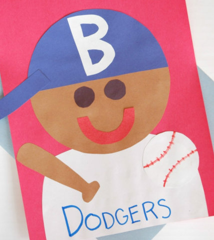 A construction paper baseball card of Jackie Robinson in his Dodgers uniform.