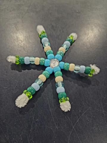 Snowflake decoration made from pipe cleaners and pony beads